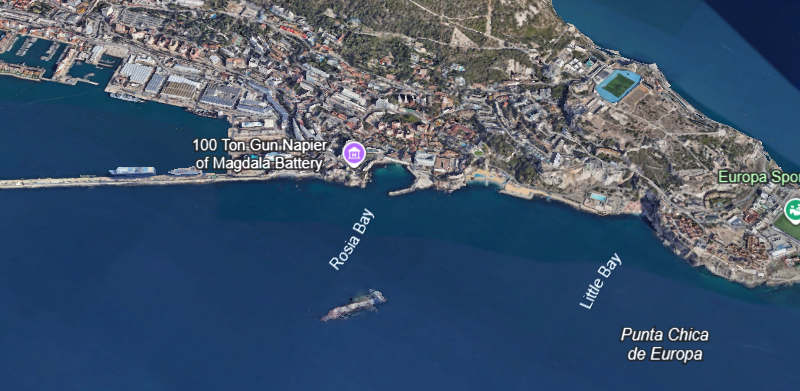 View of Gibraltar’s iconic Rock rising above the coastline with clear Mediterranean water, a landmark destination visited by Wahoo Divers Malaga.